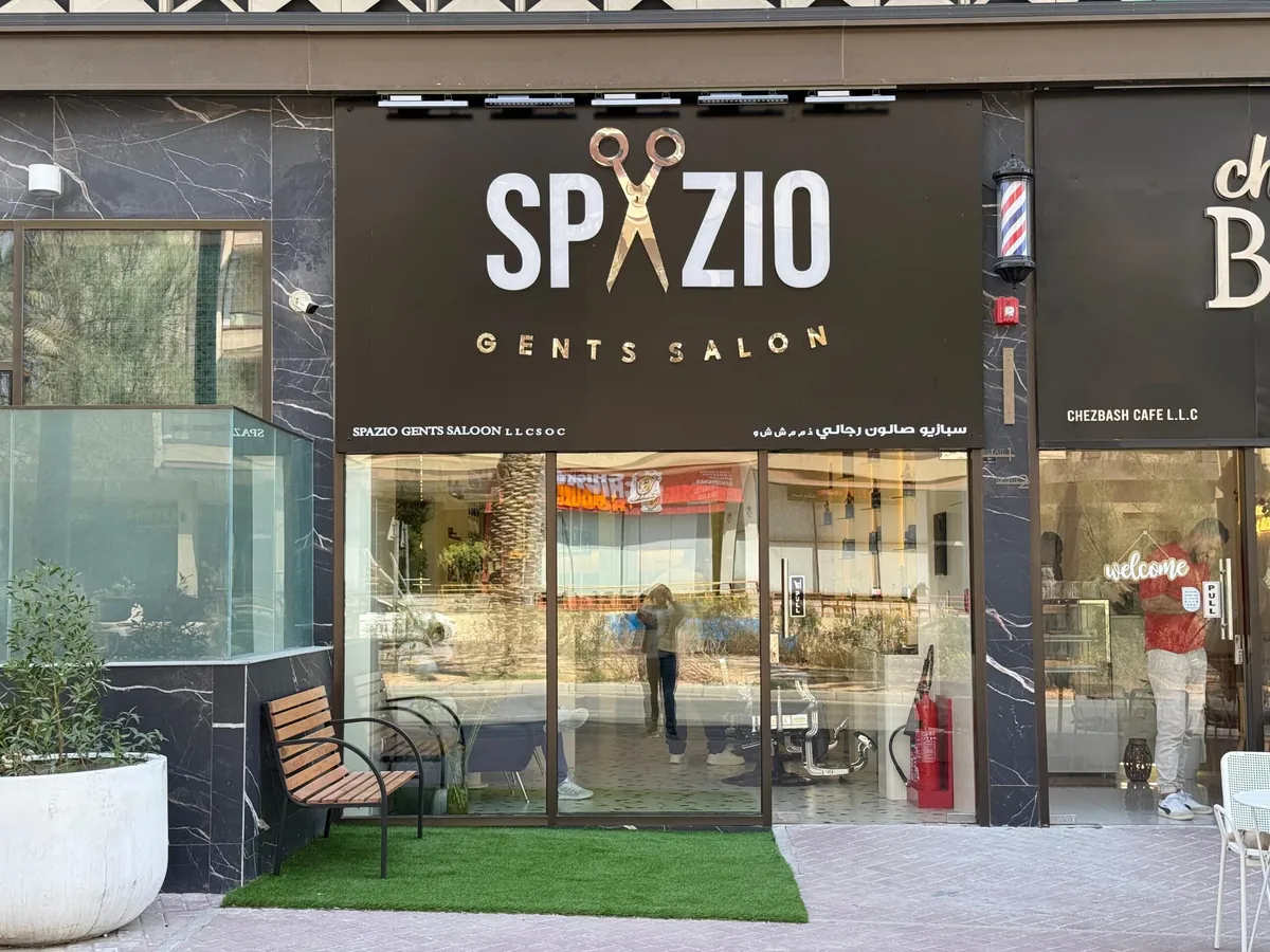 The Spazio Gents Salon shopfront on the ground floor of Lusail Residence, Jumeirah Village Circle, Dubai
