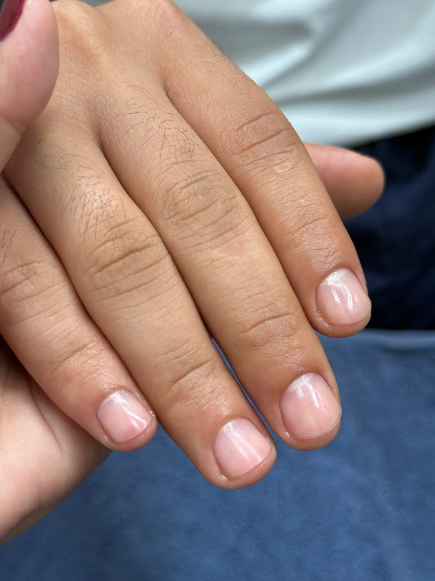 Close-up of a finished men's manicure at Spazio Gents Salon in Jumeirah Village Circle
