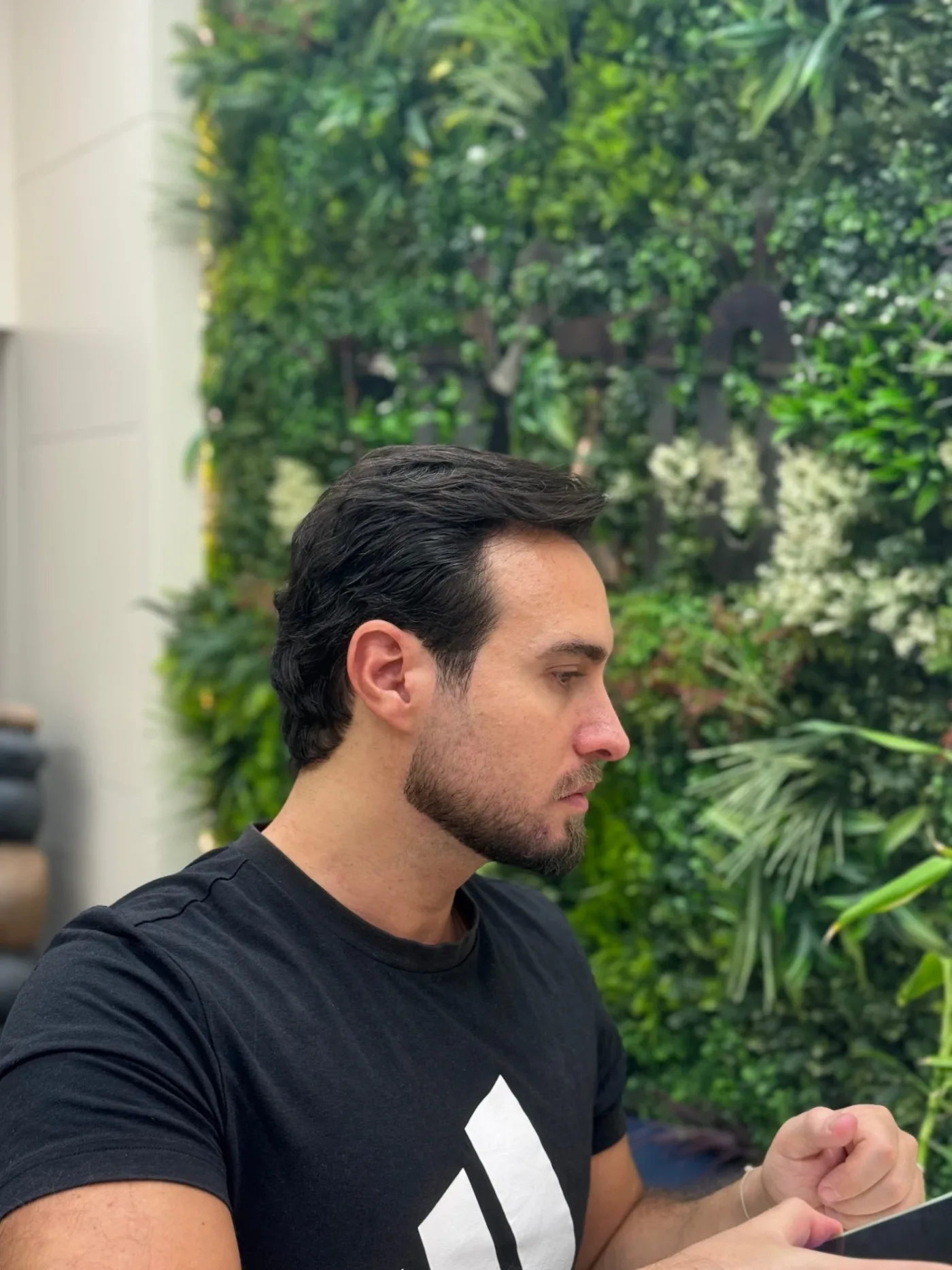 Side profile of a finished quiff haircut and beard trim at Spazio Gents Salon in JVC, Dubai